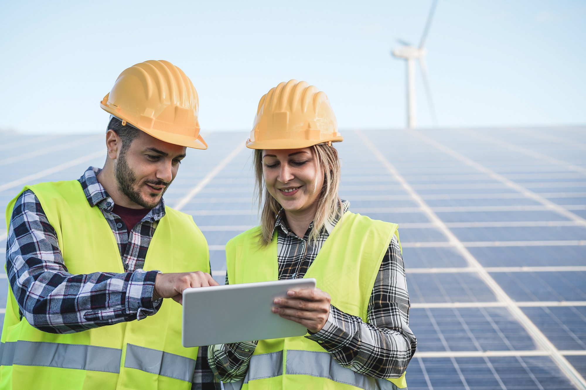 young-people-working-with-digital-tablet-at-renewa-2025-02-21-21-14-45-utc young-people-working-with-digital-tablet-at-renewa-2025-02-21-21-14-45-utc