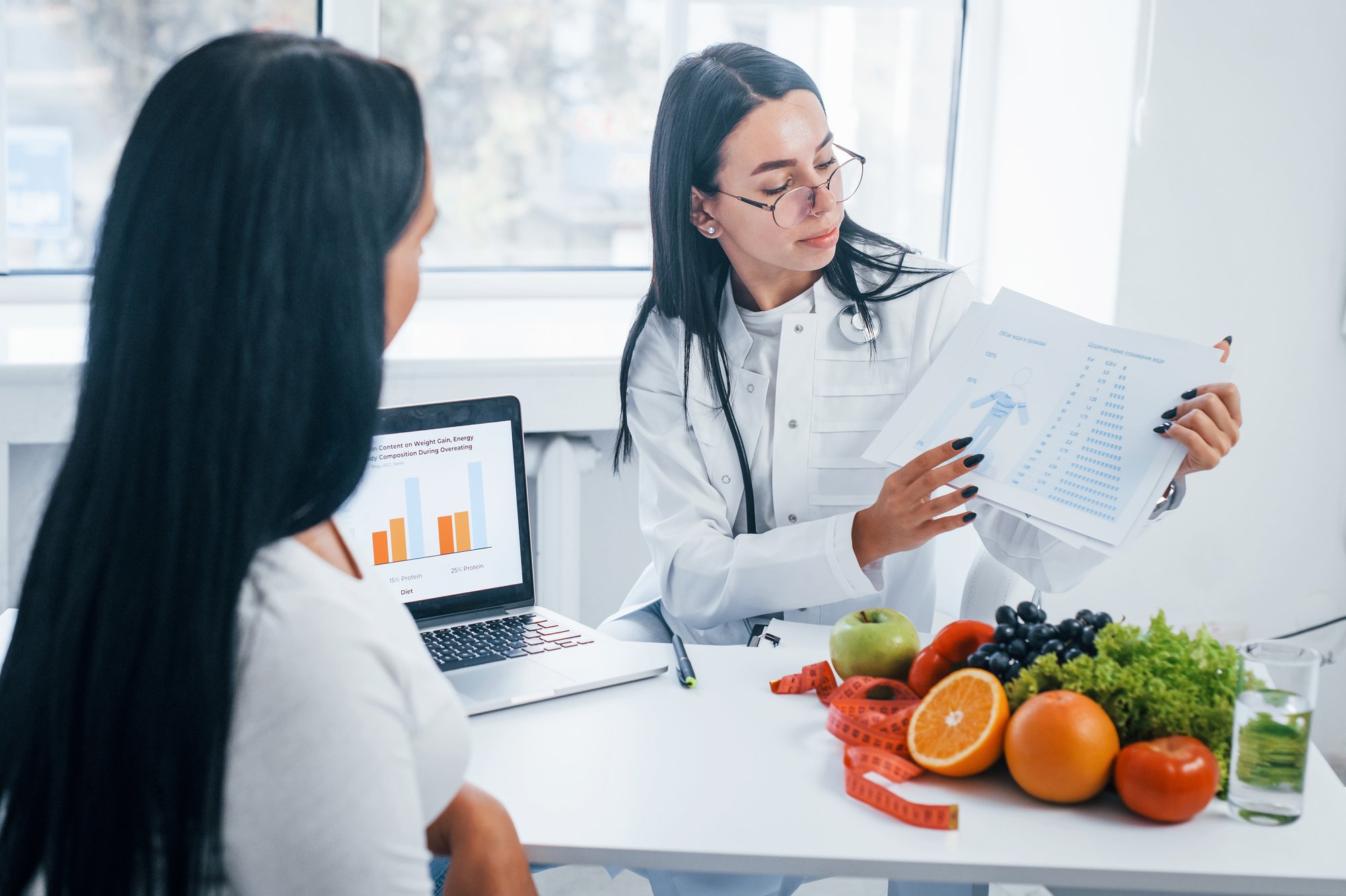 female-nutritionist-with-laptop-gives-consultation-2025-03-18-21-22-59-utc female-nutritionist-with-laptop-gives-consultation-2025-03-18-21-22-59-utc