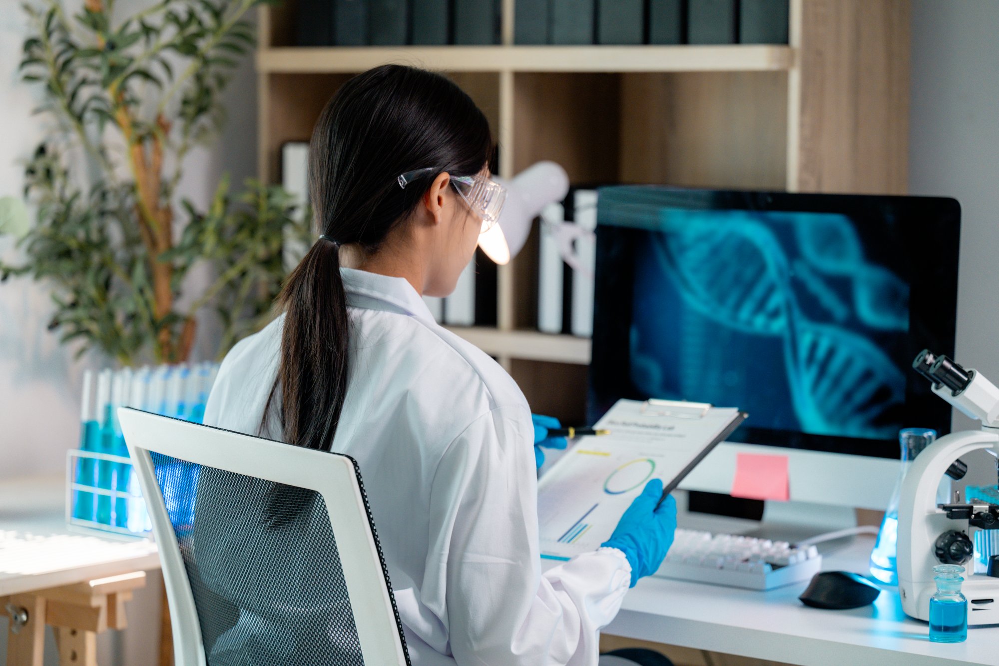 scientist-analyzing-dna-double-helix-structure-on-2025-03-06-01-26-23-utc
